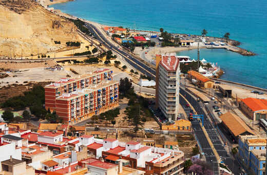 Aerial view of Alicante with the coast, the harbour and seafront residential buildings